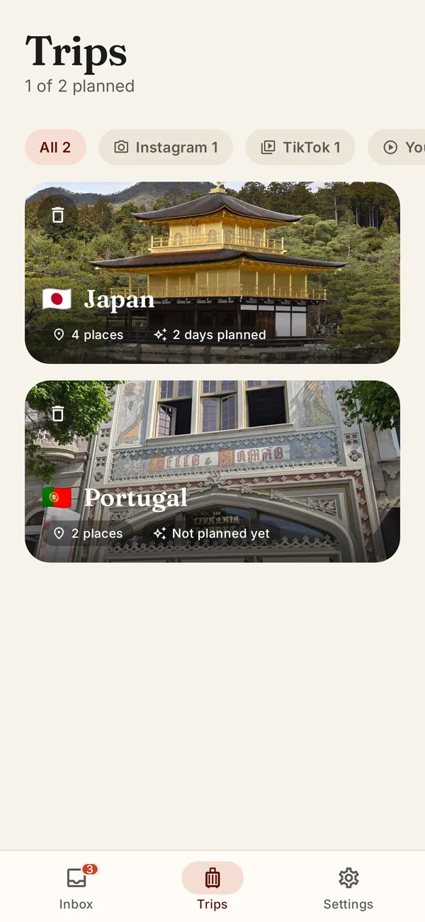 The Trips tab: one card per country with its photo and number of places.
